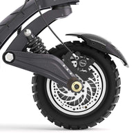Close-up of Ausom F1 Max Trottinette électrique front wheel with suspension and disc brake on 10"x3" pneumatic tire