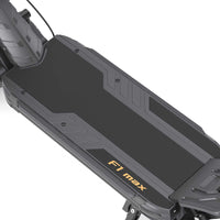 Close-up of the black Ausom F1 Max electric scooter deck with logo and tire detail